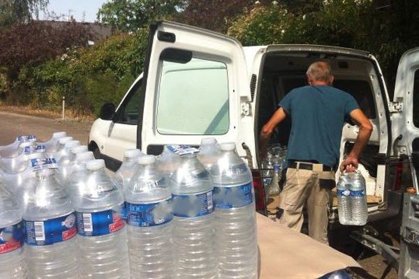 Transport de vos courses lourdes et encombrantes : packs d'eau, lessive, boissons, etc.